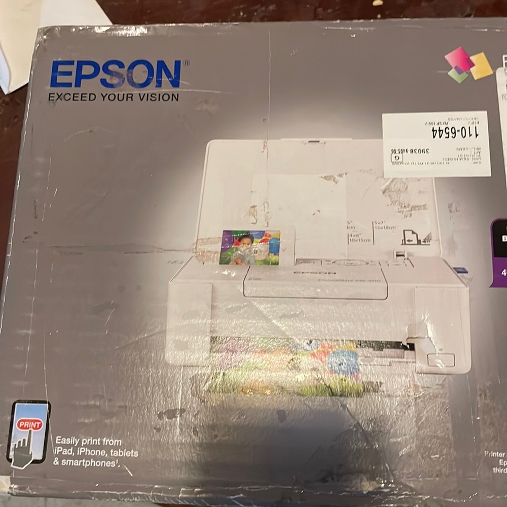 I’m selling this photo printer that I purchased at Walmart. Brand new